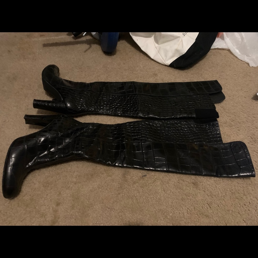 Knee high black leather boots